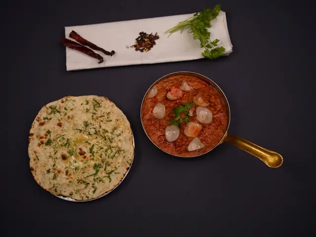 Kulcha with curry, a North Indian classic